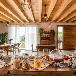 Al Comarel , Tarzo Italia